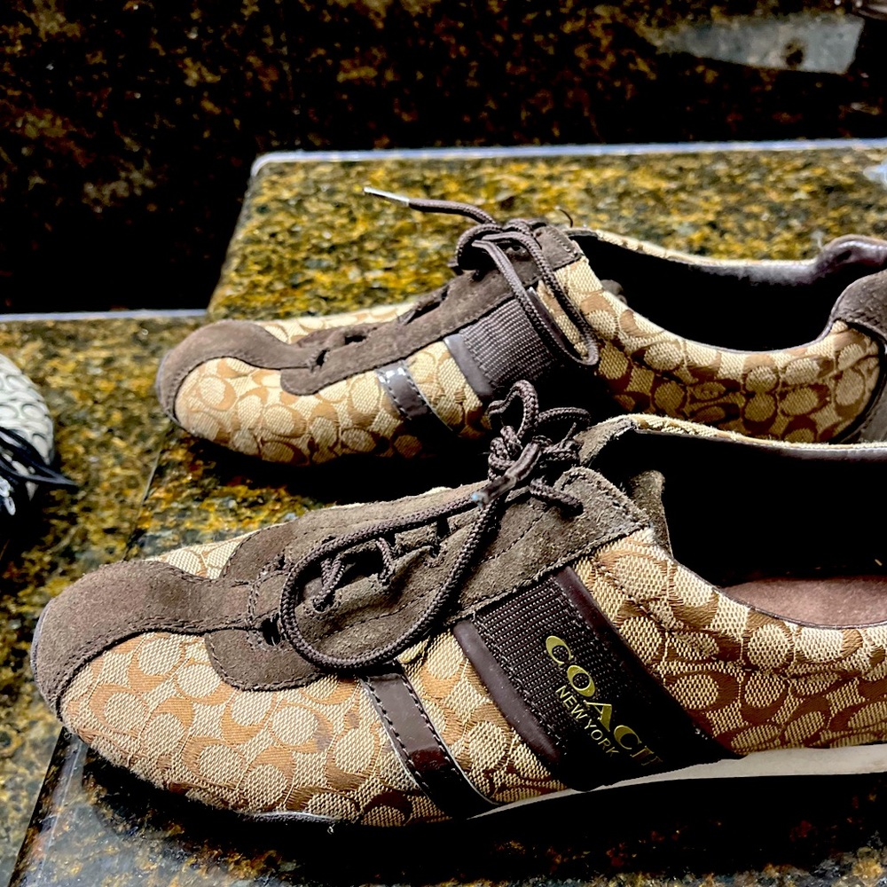 Coach lace up flats.